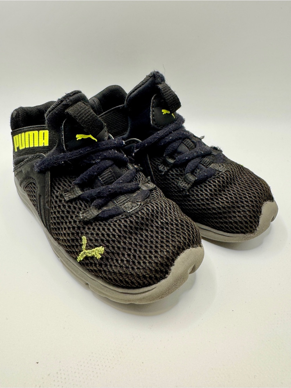 Puma Kids Black Sneakers with Neon Yellow Accents